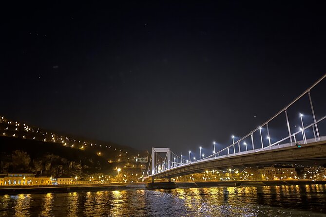 Bright Lights of Budapest Night Tour with Boat Cruise and Wine - What the guide adds to the evening