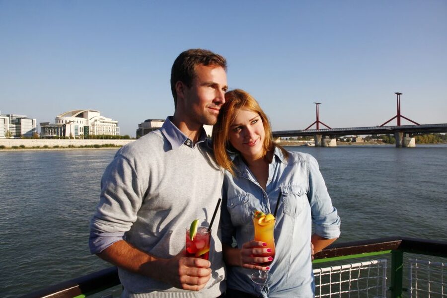 Budapest: 1 hr Sunshine Booze Cruise with Prosecco - The National Theater and the southern stretch