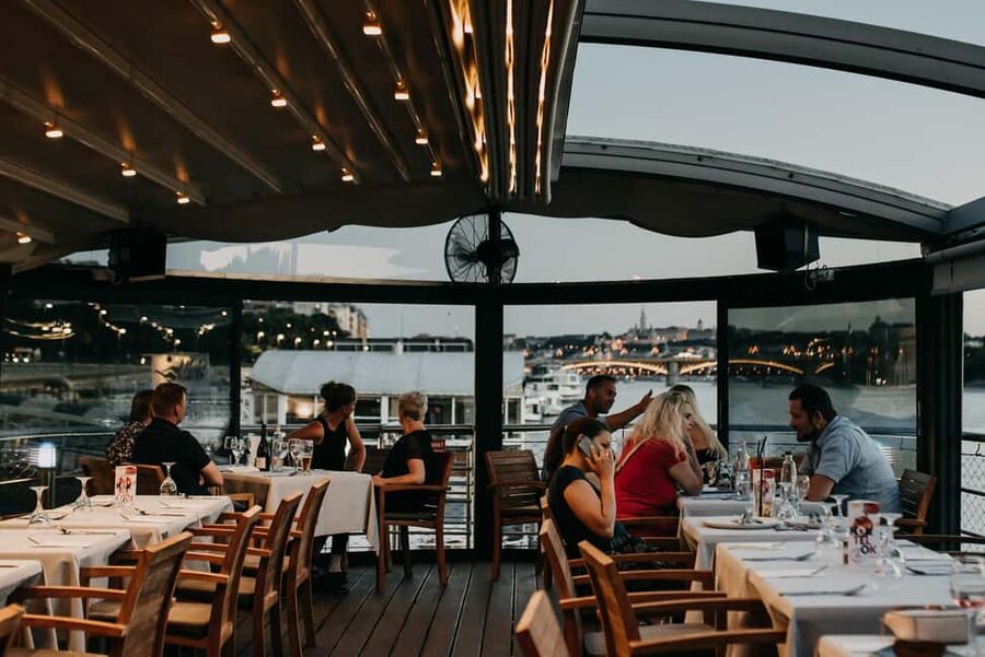Budapest: 2-Course Dinner for 2 on a Boat Restaurant - Arriving at the Vogue boat on the Danube