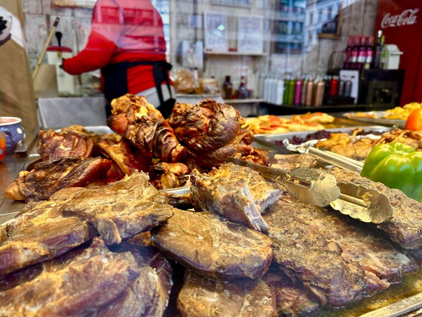 Budapest: Christmas Market Guided Walking Tour with Tastings - Walking through Budapest’s Christmas market mood
