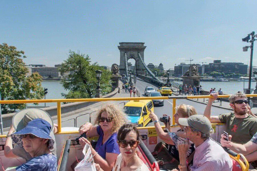Budapest: City Sightseeing Hop-On Hop-Off Bus Tour & Extras - The walking tour adds the human detail