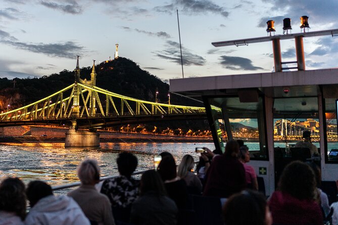 Budapest Danube River Sightseeing Night Cruise with Drink - The glass-topped boat and seating choices