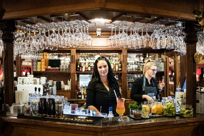 Budapest Evening Cruise with Entertainment and Drink Options - Boarding, seating, and the best place to watch