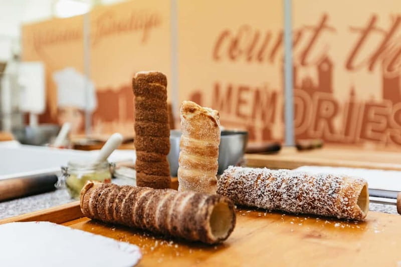 Budapest: Hungarian Chimney Cake Workshop in the City Center - Shaping the dough around the cone