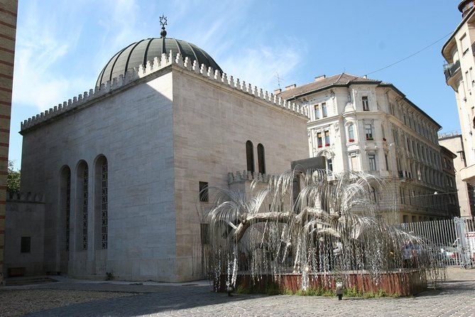 Budapest Jewish Heritage Memorial Walking Tour & Synagogue Entry - Walking through the former Jewish Quarter