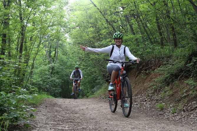 Budapest: Private Adventure Sightseeing Bicycle Tour - Taking the cog railway toward Normafa