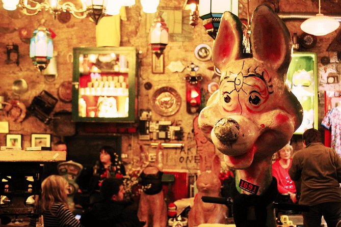 Budapest Ruin Bars Evening Walking Tour with Drinks & Street Food - Street art, old buildings, and District 7 stories