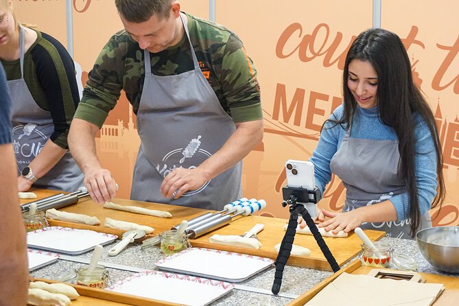 Chimney Cake Workshop Budapest Downtown - Kürtőskalács Class - Making kürtőskalács near St Stephen’s Basilica