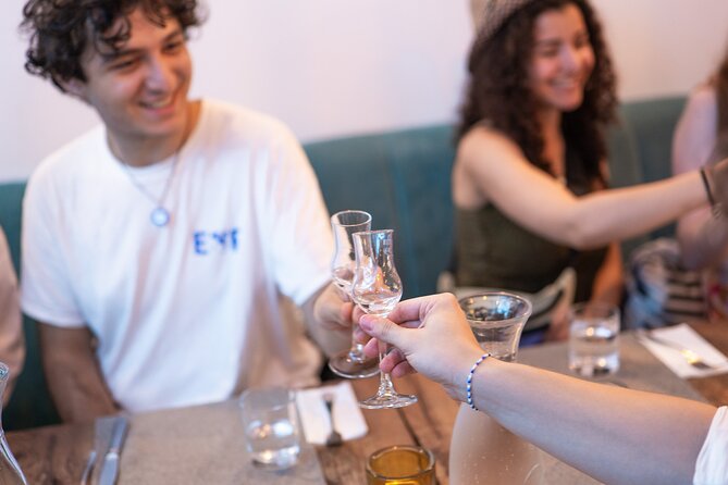 Flavors of Budapest: Guided Food & Drink Tour - Walking through District 7 and the old Jewish Quarter