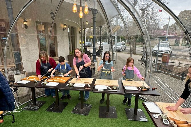 Kürtőskalács: Chimney Cake Workshop in City Park Budapest - The one-hour baking sequence