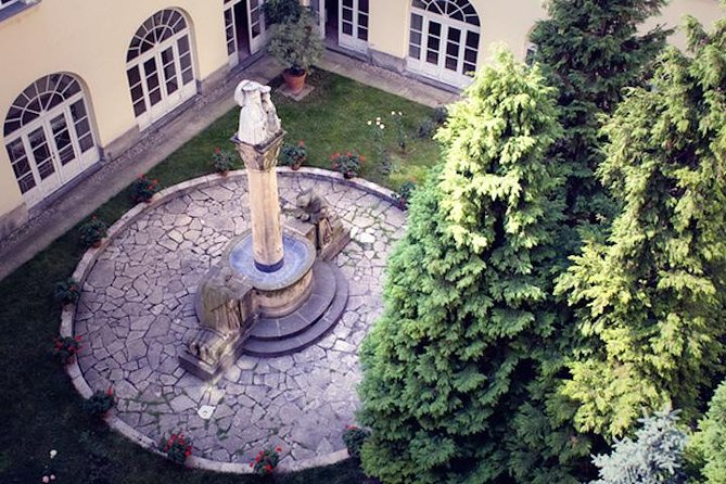 Secret Gardens and Squares Downtown | Walking Tour of Budapest - Behind Budapest’s battered doors